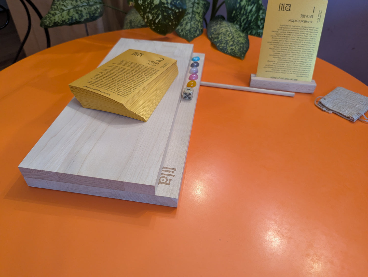 Foldable Leela game set. Wooden Yoga board game of self-knowledge.