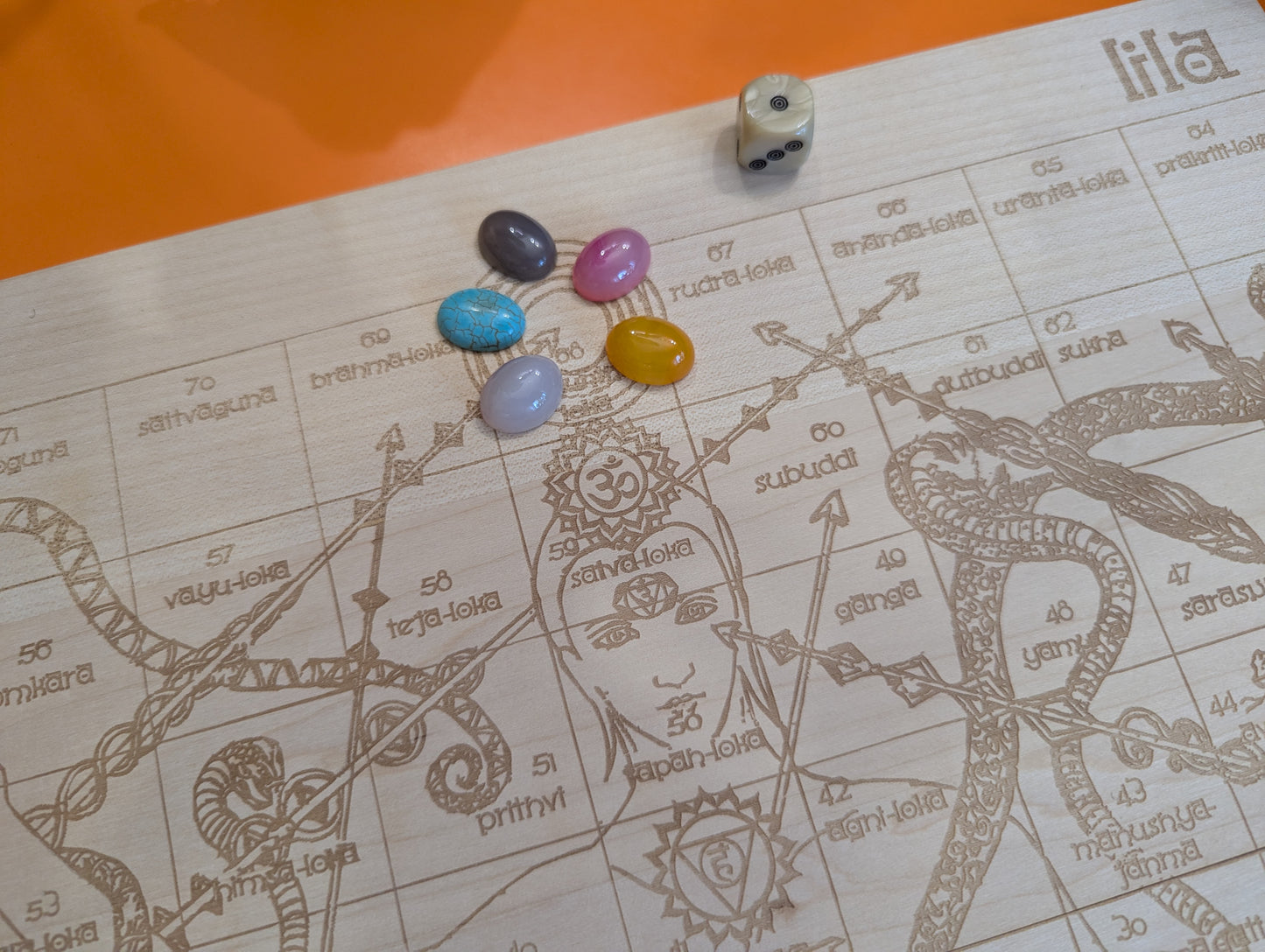Foldable Leela game set. Wooden Yoga board game of self-knowledge.