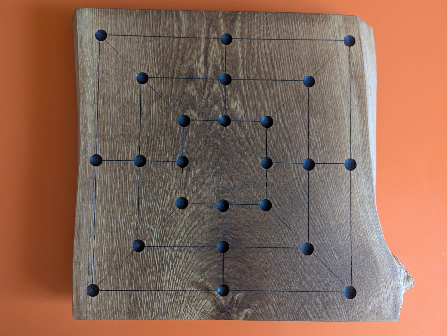 Handmade Twelve/Nine men's Morris game set. Solid elm wood board with live egde.