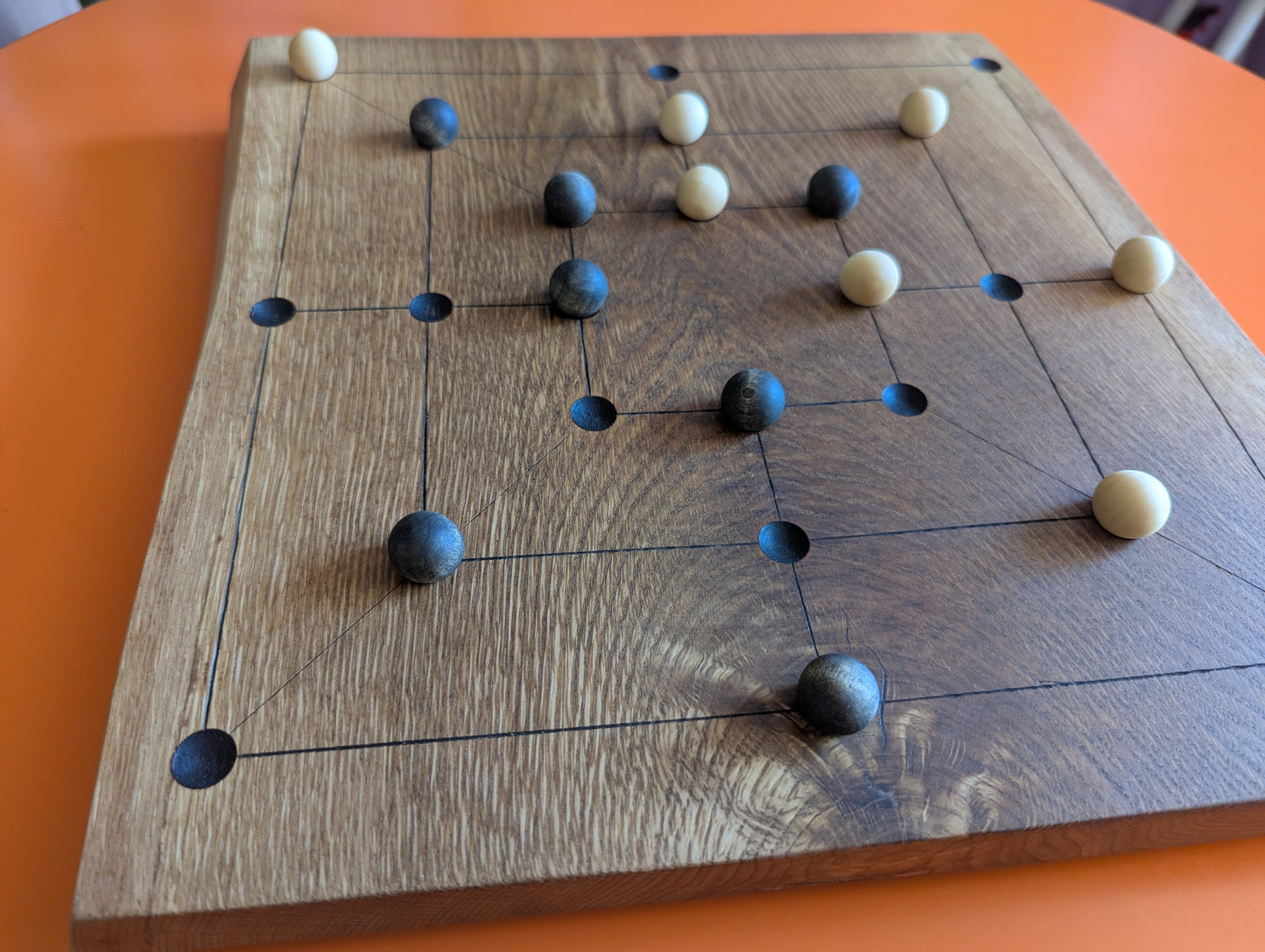 Handmade Twelve/Nine men's Morris game set. Solid elm wood board with live egde.