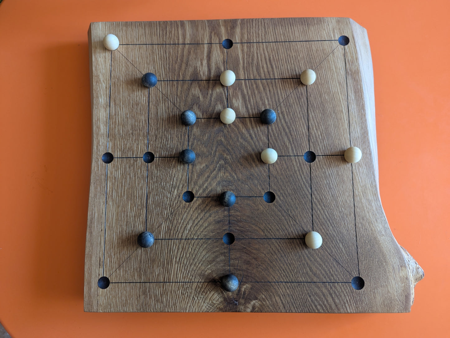 Handmade Twelve/Nine men's Morris game set. Solid elm wood board with live egde.