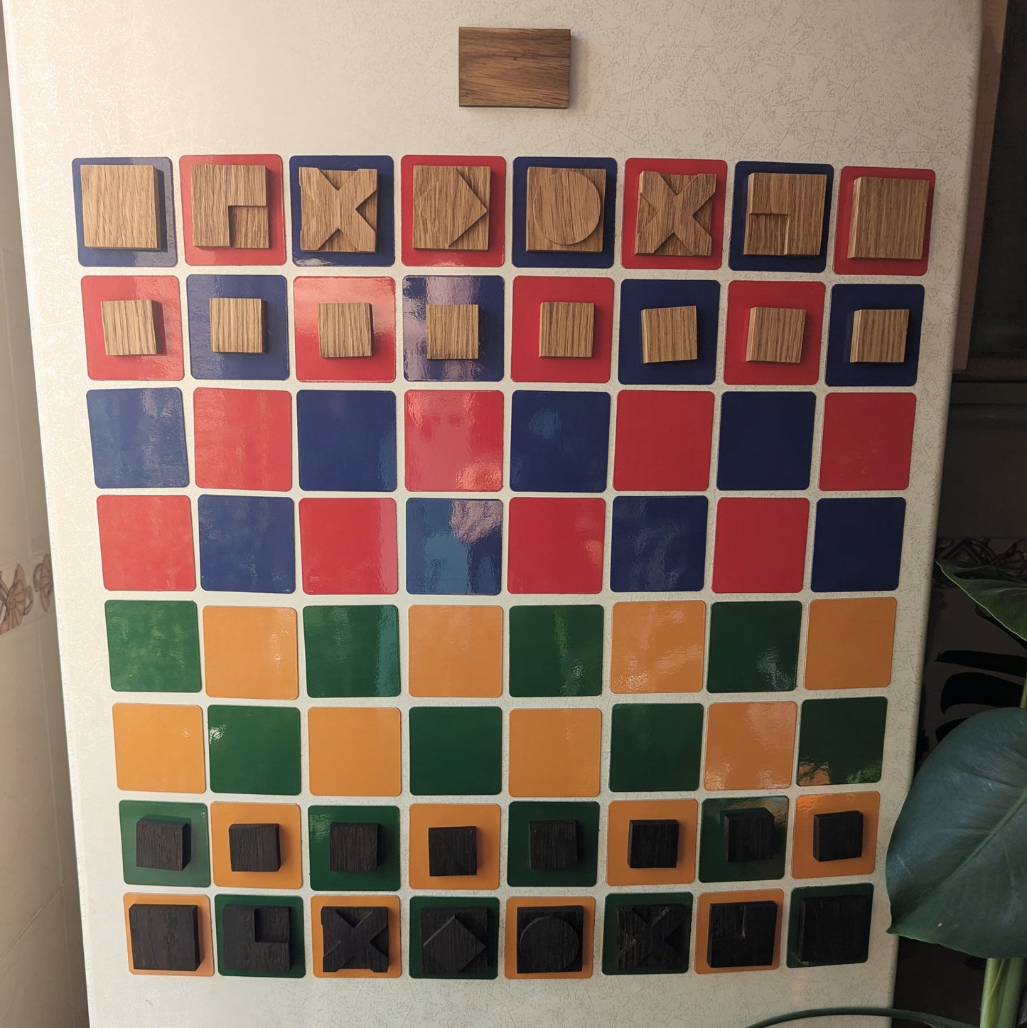 Handmade vertical magnetic chess set. Wooden flat Bauhaus inspired chessmen with Art chessboard