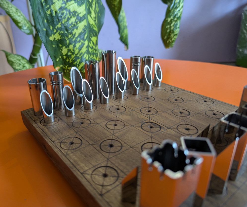 Stainless Steel Chess Set with one-color solid walnut Chessboard. Handmade