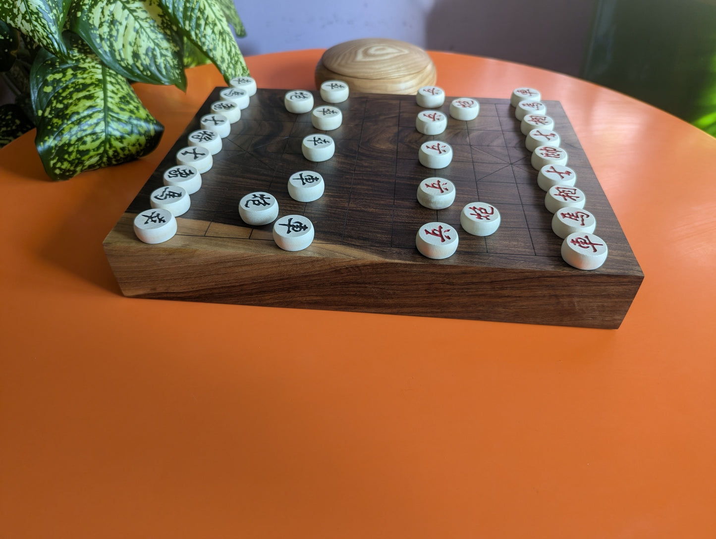 Solid walnut Xiangqi game set. Hand carved lines