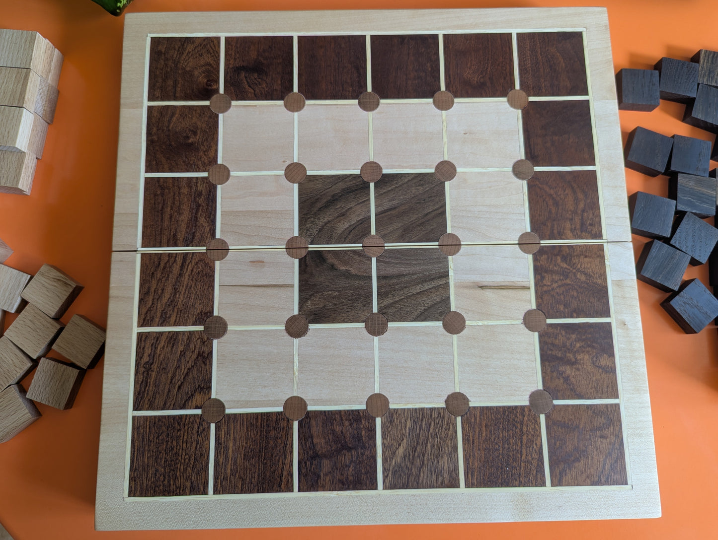 Foldable wooden Tak game set.
