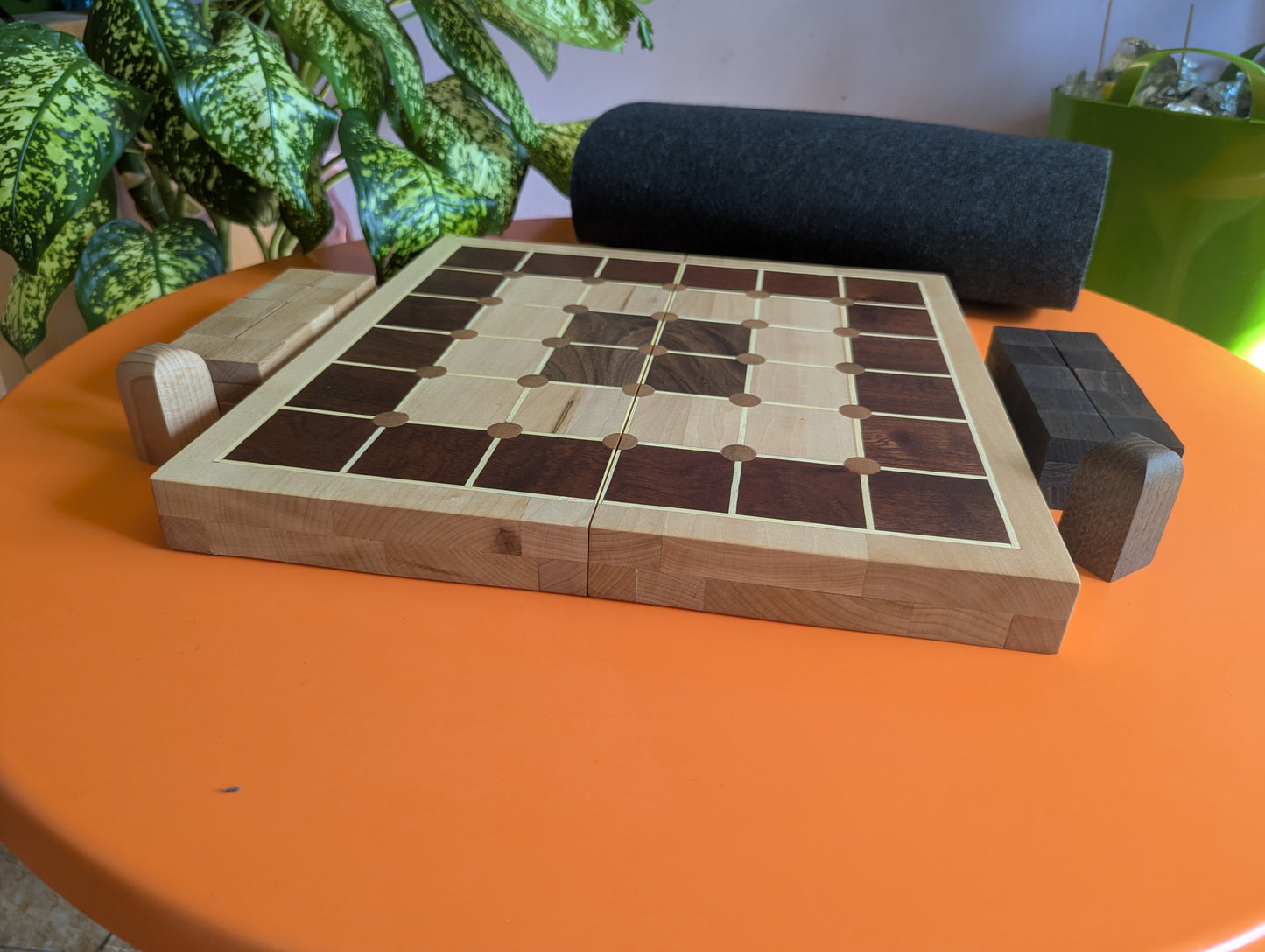 Foldable wooden Tak game set.