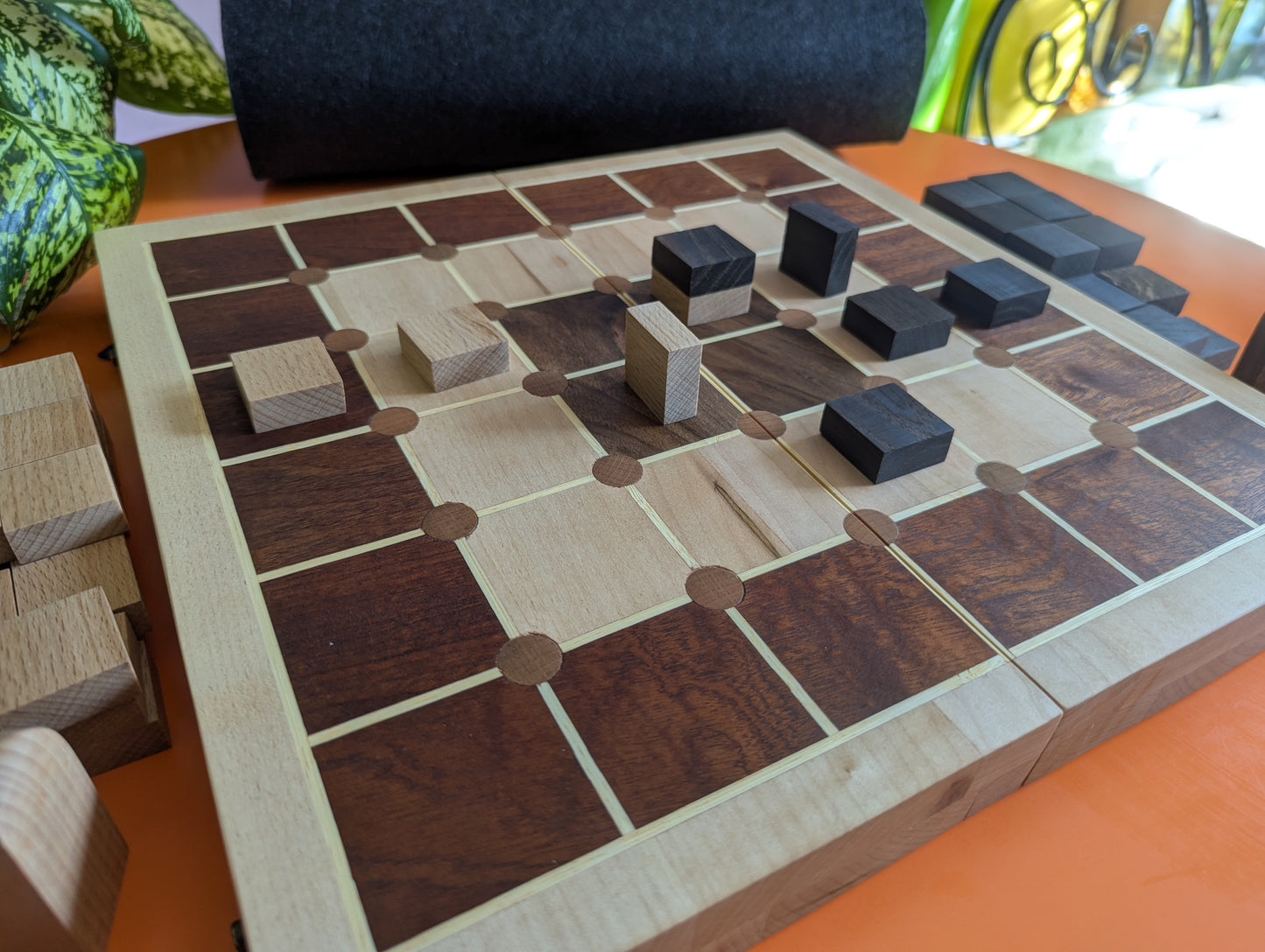 Foldable wooden Tak game set.