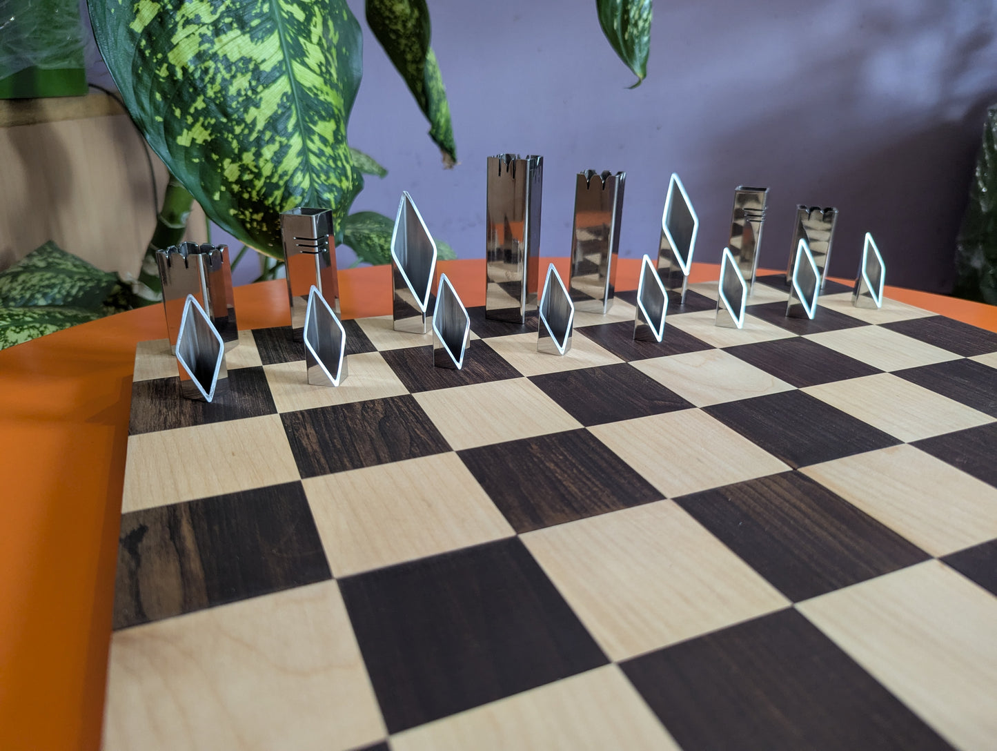 Handmade Stainless Steel Chess Set. Square vs. Round.