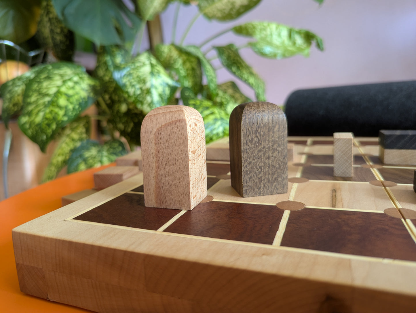 Foldable wooden Tak game set.