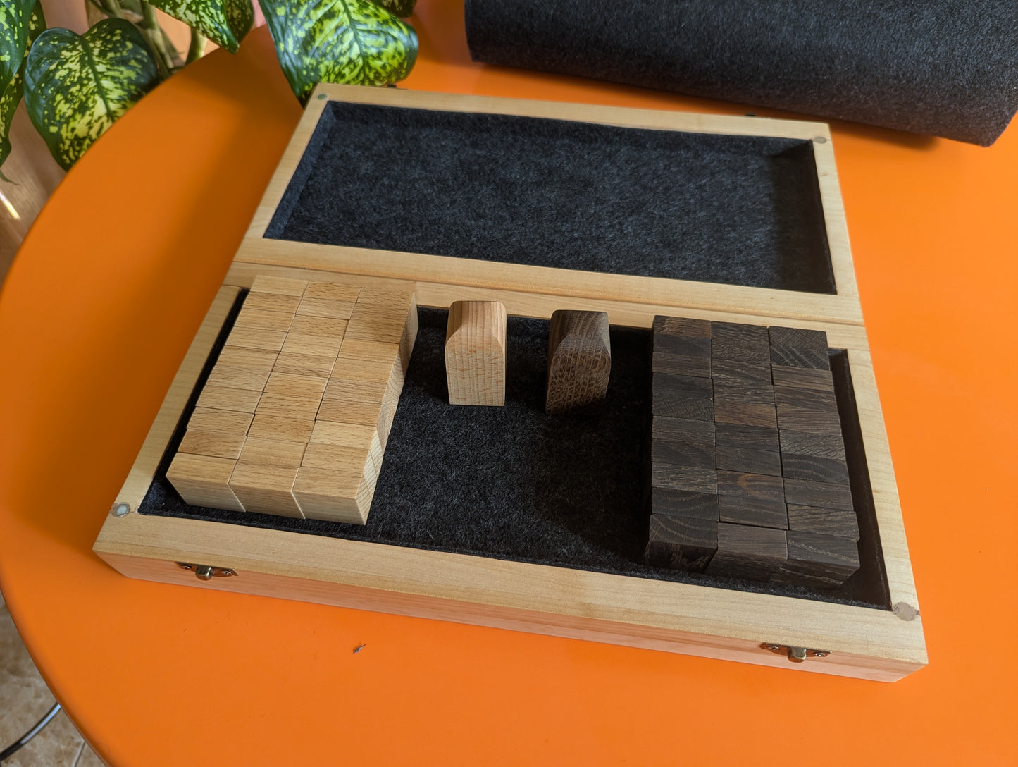 Foldable wooden Tak game set.