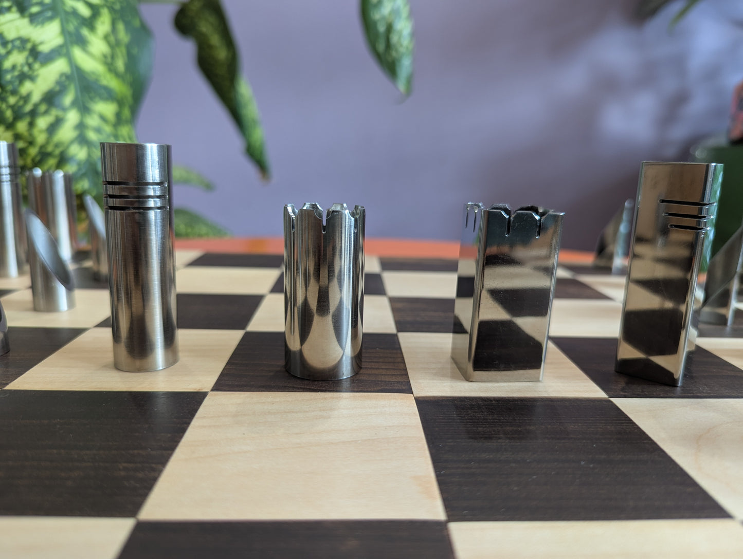 Handmade Stainless Steel Chess Set. Square vs. Round.