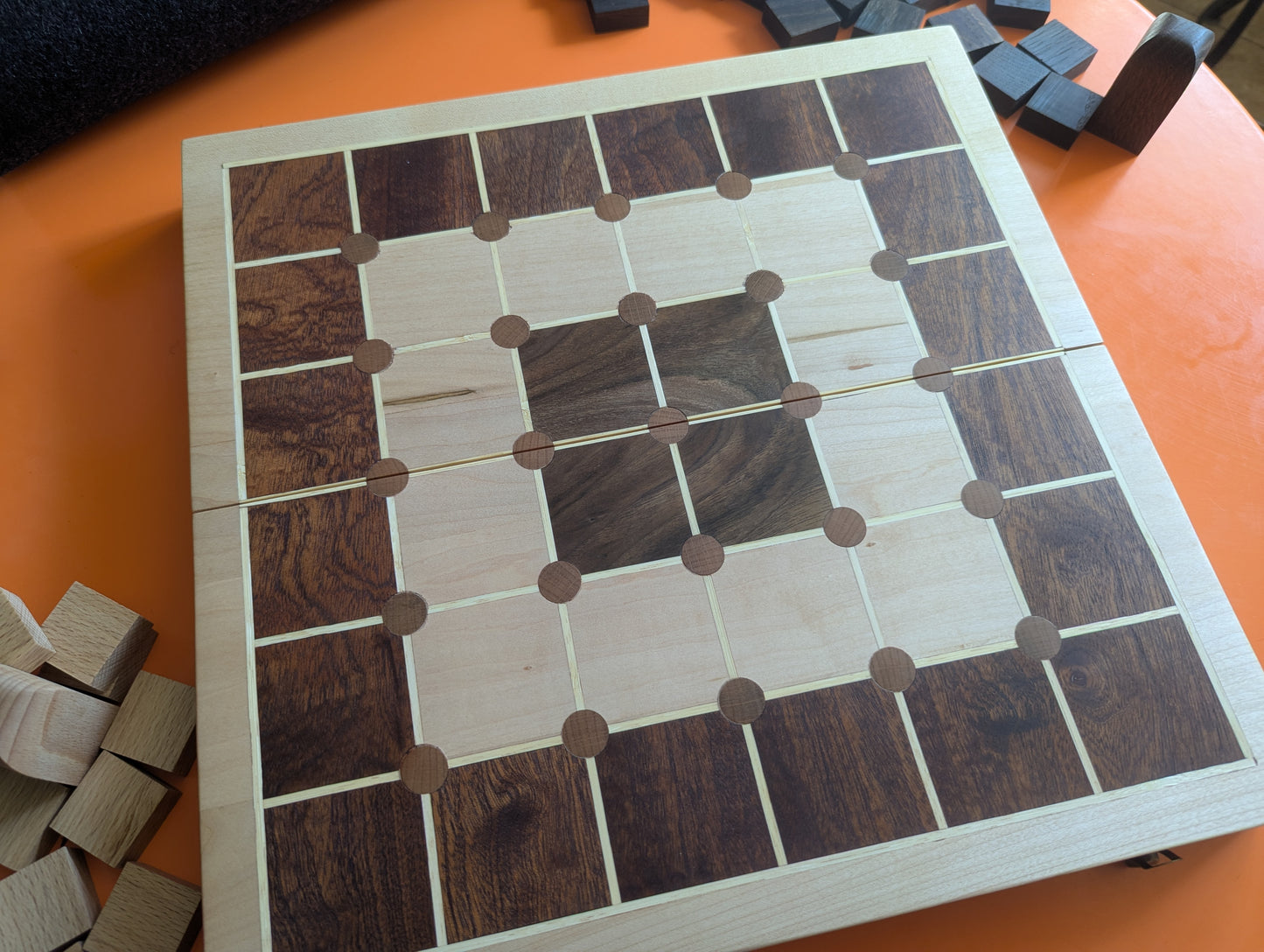 Foldable wooden Tak game set.