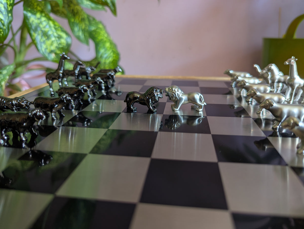 Luxury unusual chess set. Metal animal chess pieces in walnut box