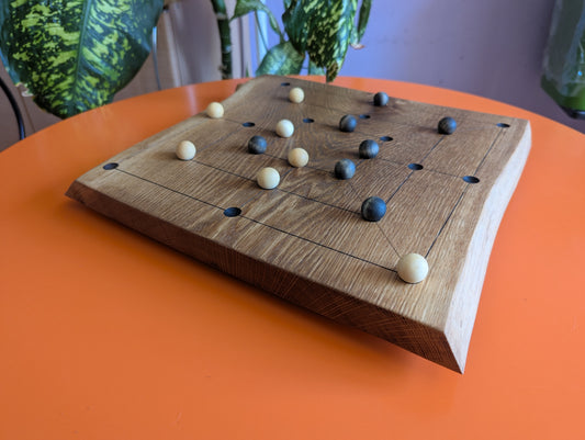 Handmade Twelve/Nine men's Morris game set. Solid elm wood board with live egde.
