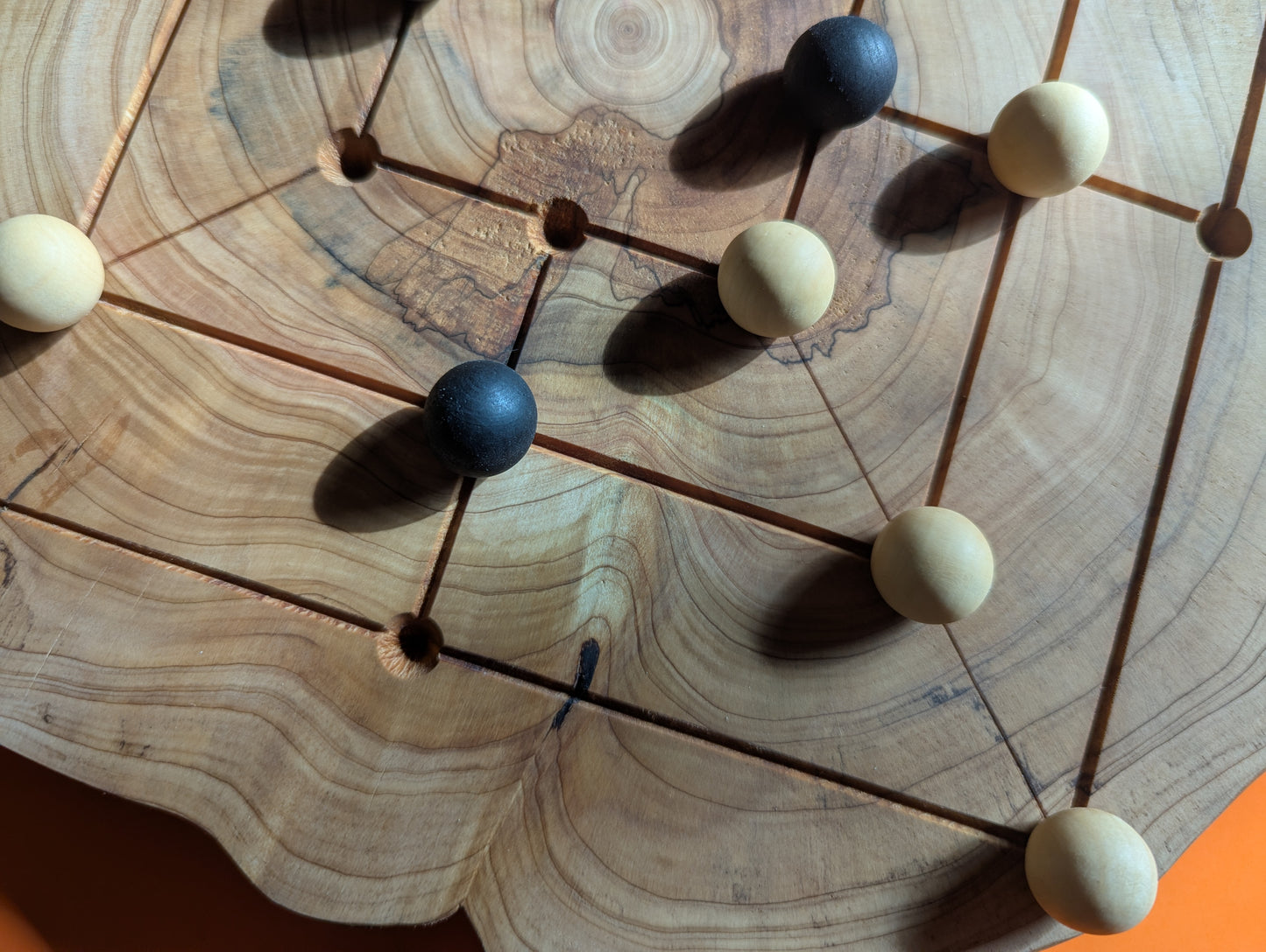 Handmade Twelve/Nine men's Morris game set. Circle Juniper wood board with live egde.