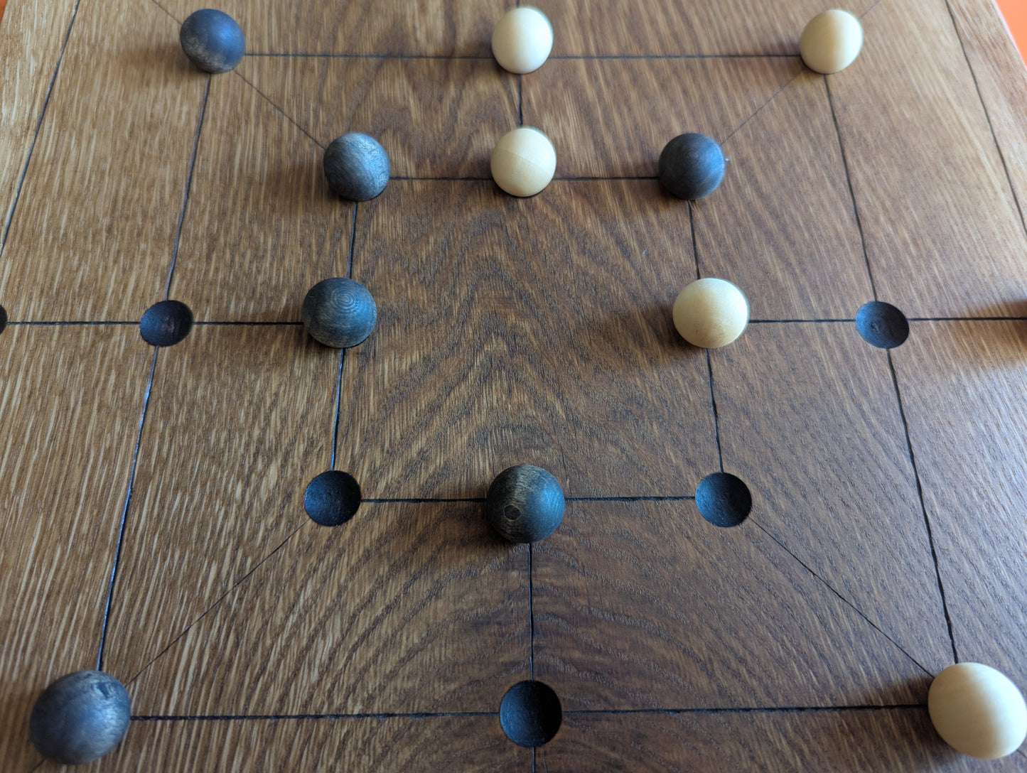 Handmade Twelve/Nine men's Morris game set. Solid elm wood board with live egde.