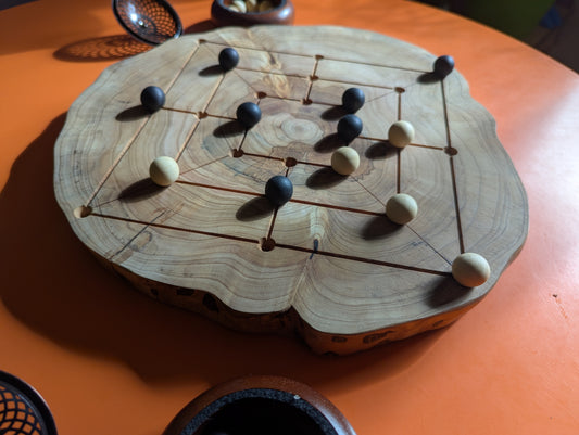 Handmade Twelve/Nine men's Morris game set. Circle Juniper wood board with live egde.