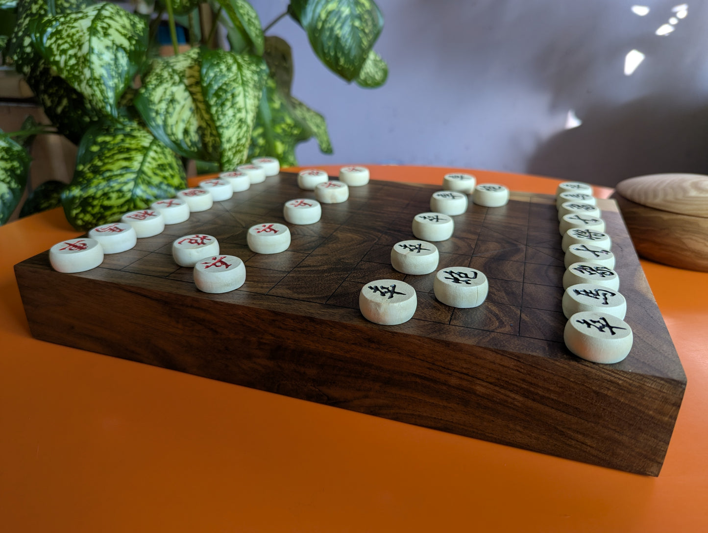 Solid walnut Xiangqi game set. Hand carved lines