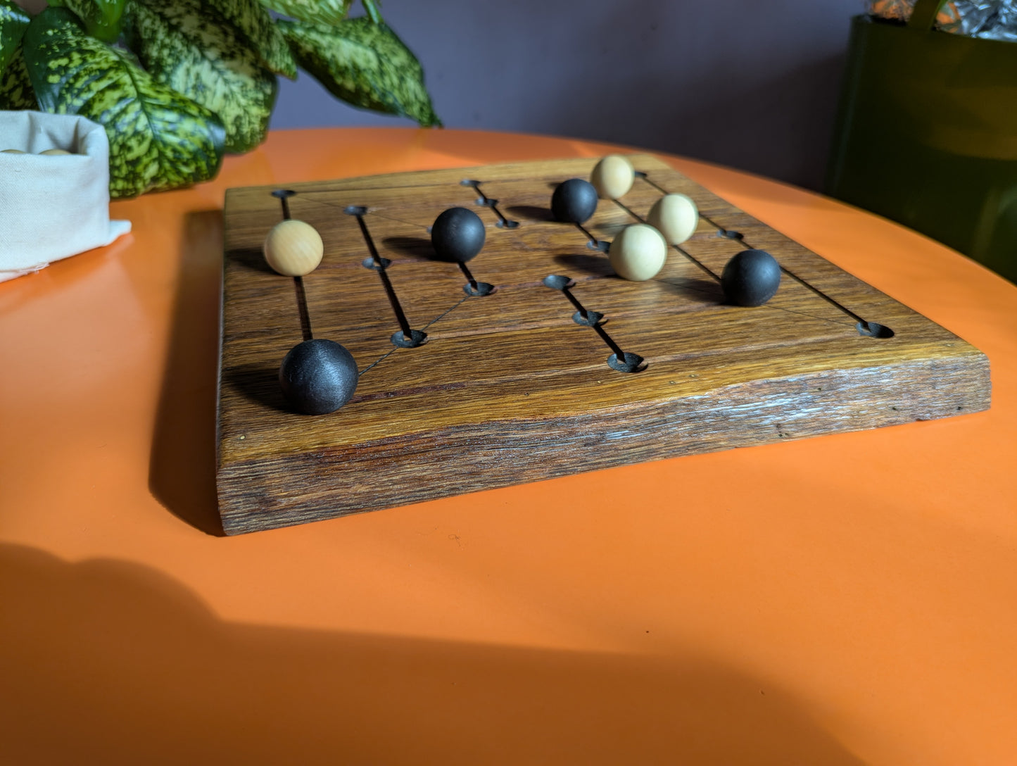 Handmade Twelve/Nine men's Morris game set. Solid oak wood board with live egde.