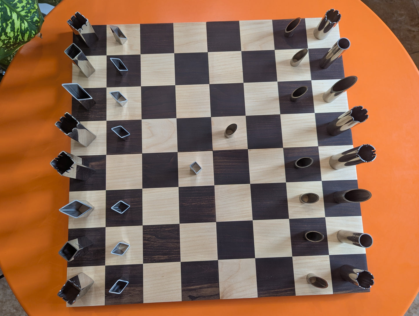 Handmade Stainless Steel Chess Set. Square vs. Round.