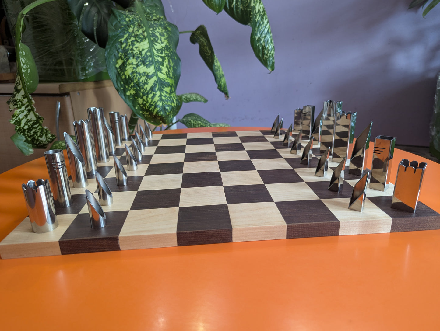 Handmade Stainless Steel Chess Set. Square vs. Round.