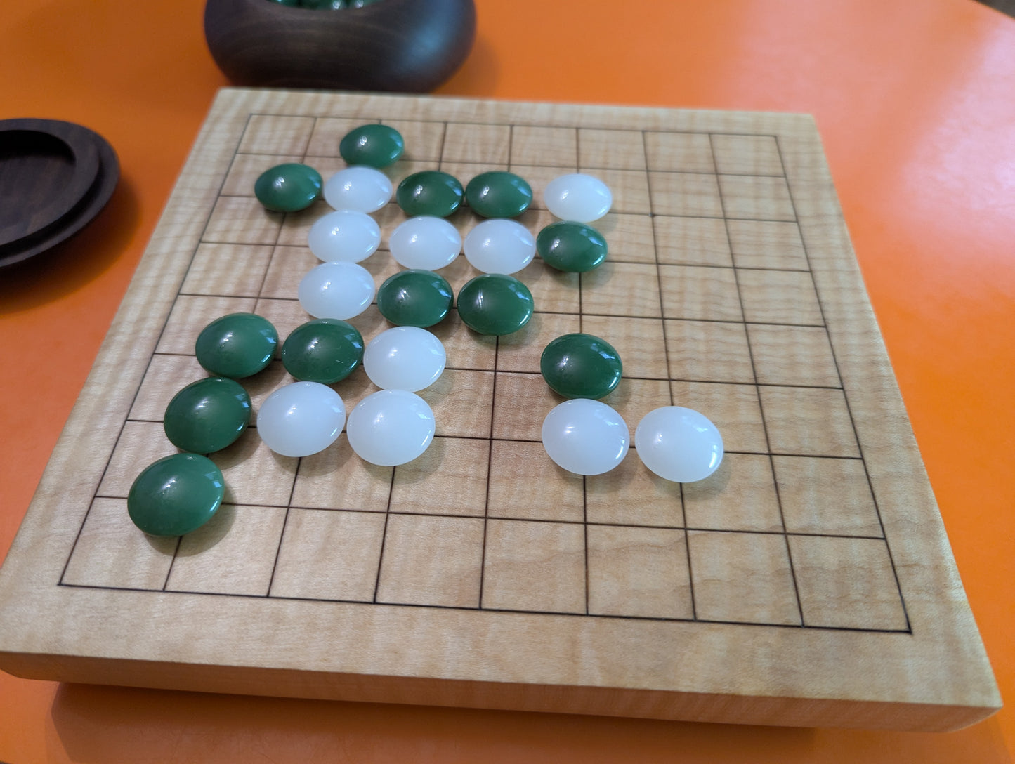Solid maple 9x9 Goban with wave grain wood. Hand carved game Go board.