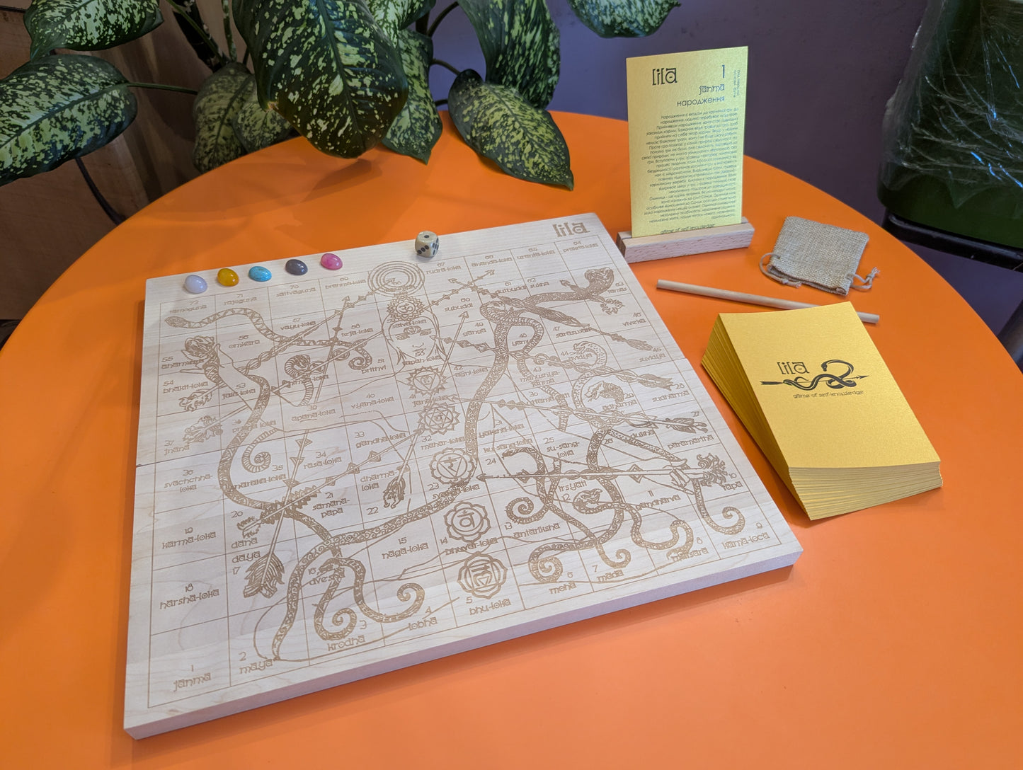 Foldable Leela game set. Wooden Yoga board game of self-knowledge.