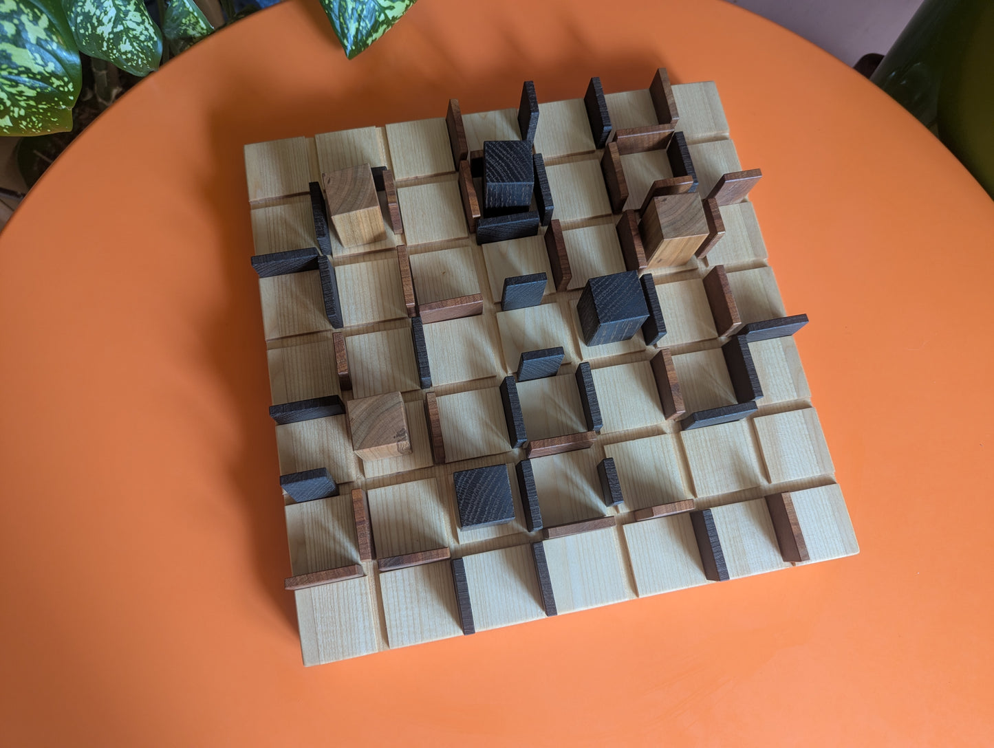 13" wooden Entrapment game set.