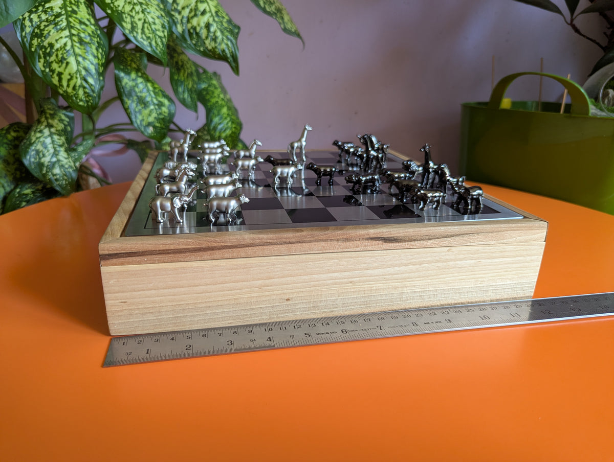 Luxury unusual chess set. Metal animal chess pieces in walnut box