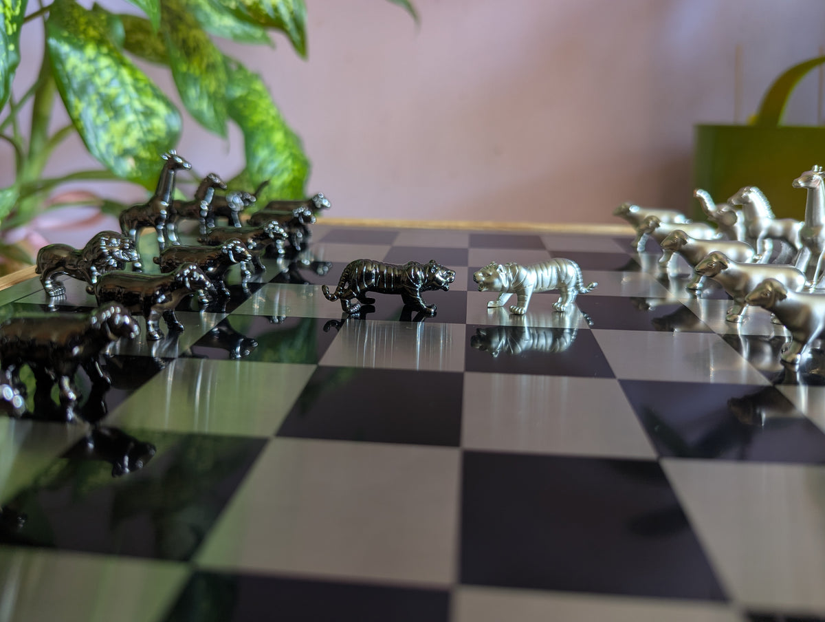 Luxury unusual chess set. Metal animal chess pieces in walnut box