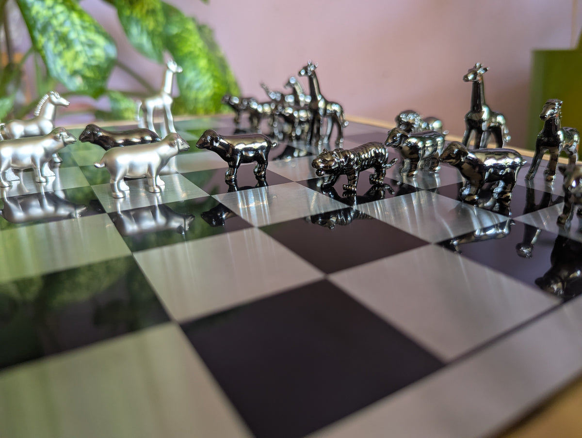 Luxury unusual chess set. Metal animal chess pieces in walnut box