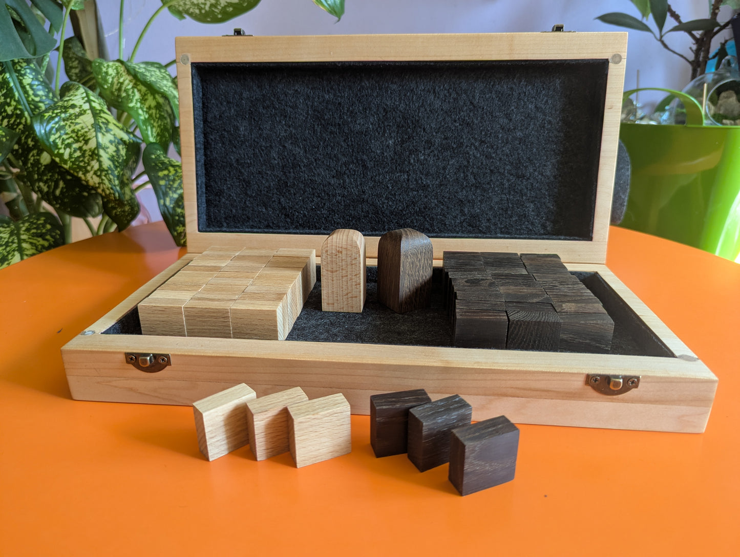 Foldable wooden Tak game set.