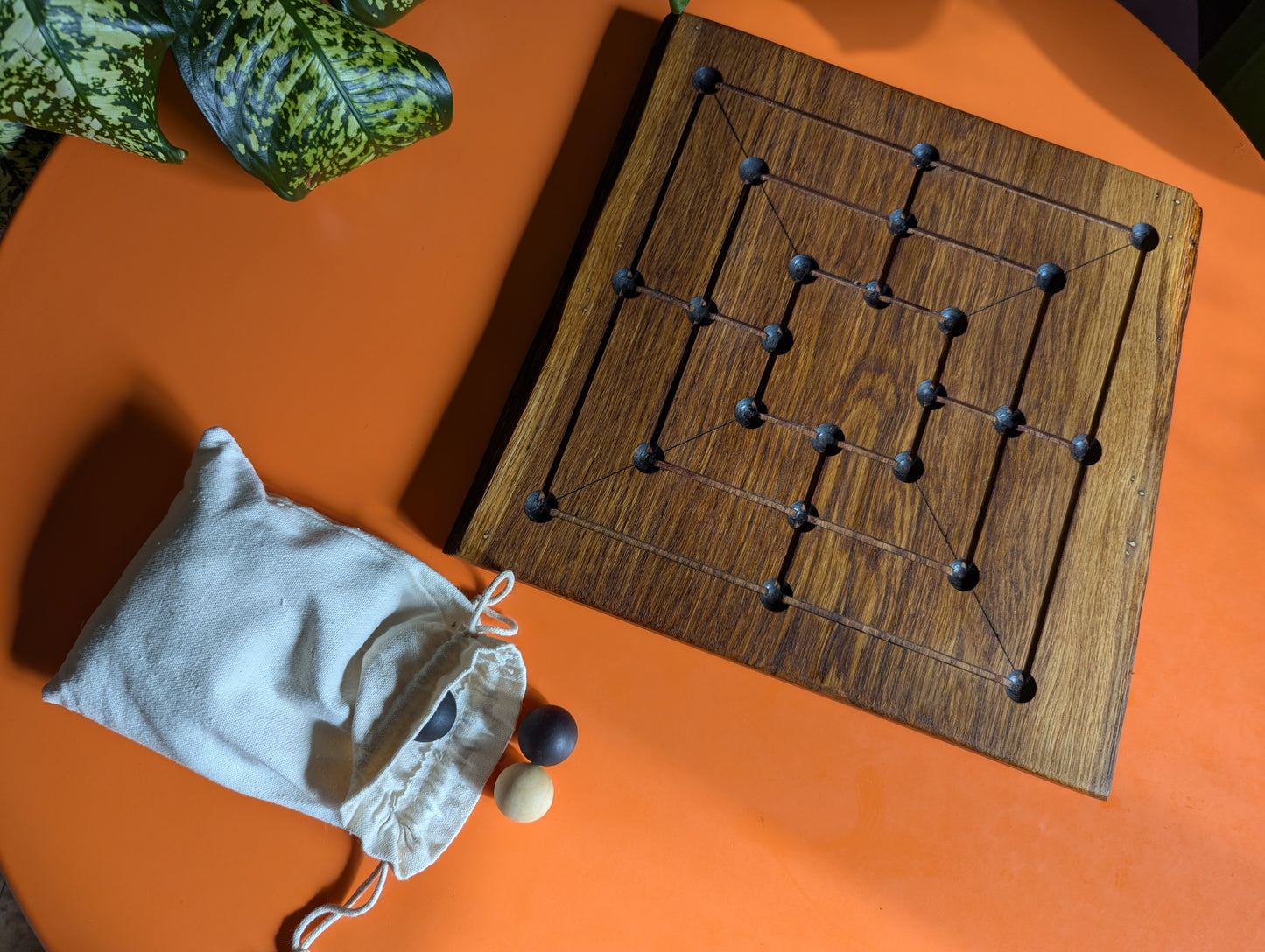 Handmade Twelve/Nine men's Morris game set. Solid oak wood board with live egde.