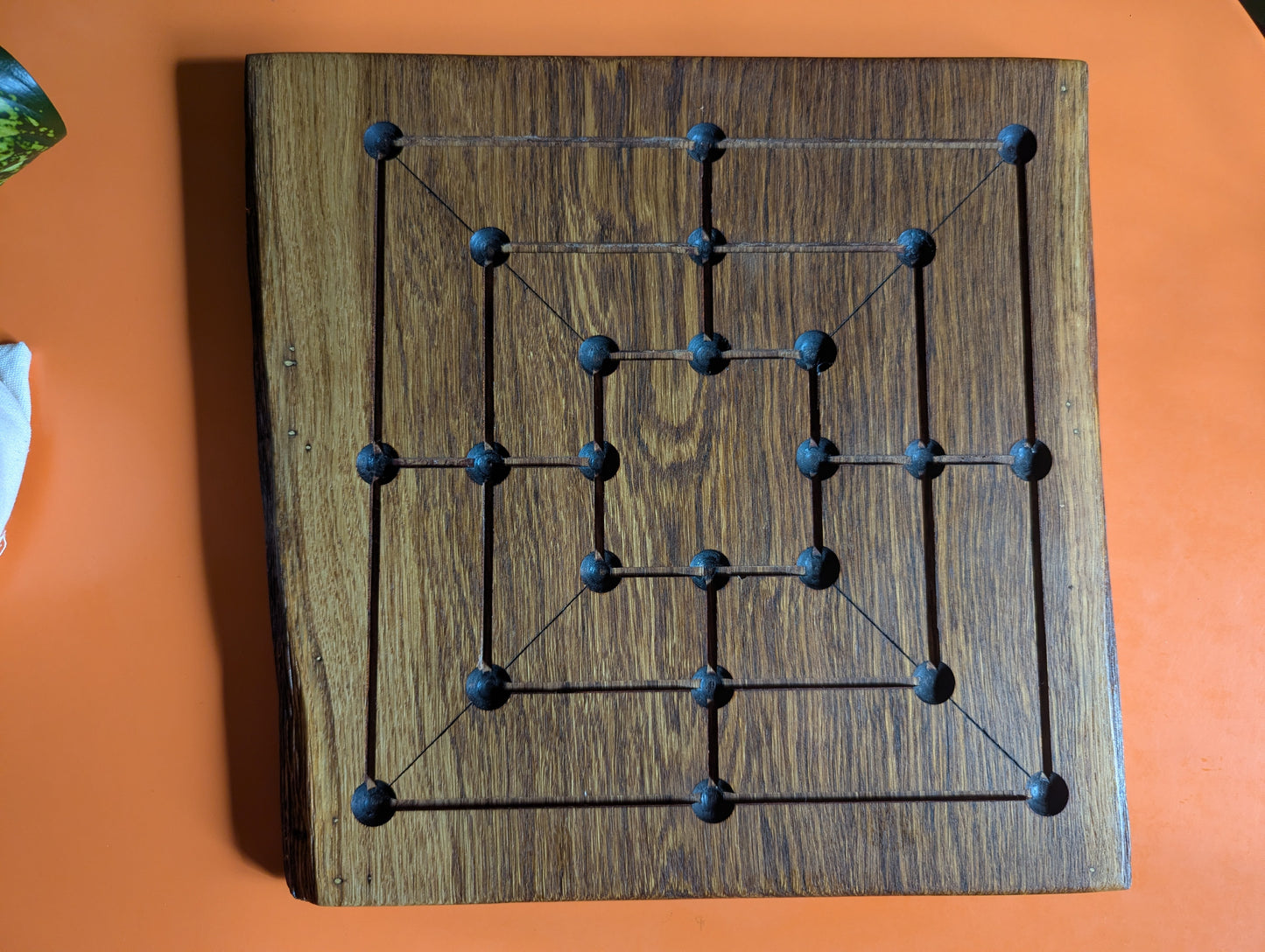 Handmade Twelve/Nine men's Morris game set. Solid oak wood board with live egde.