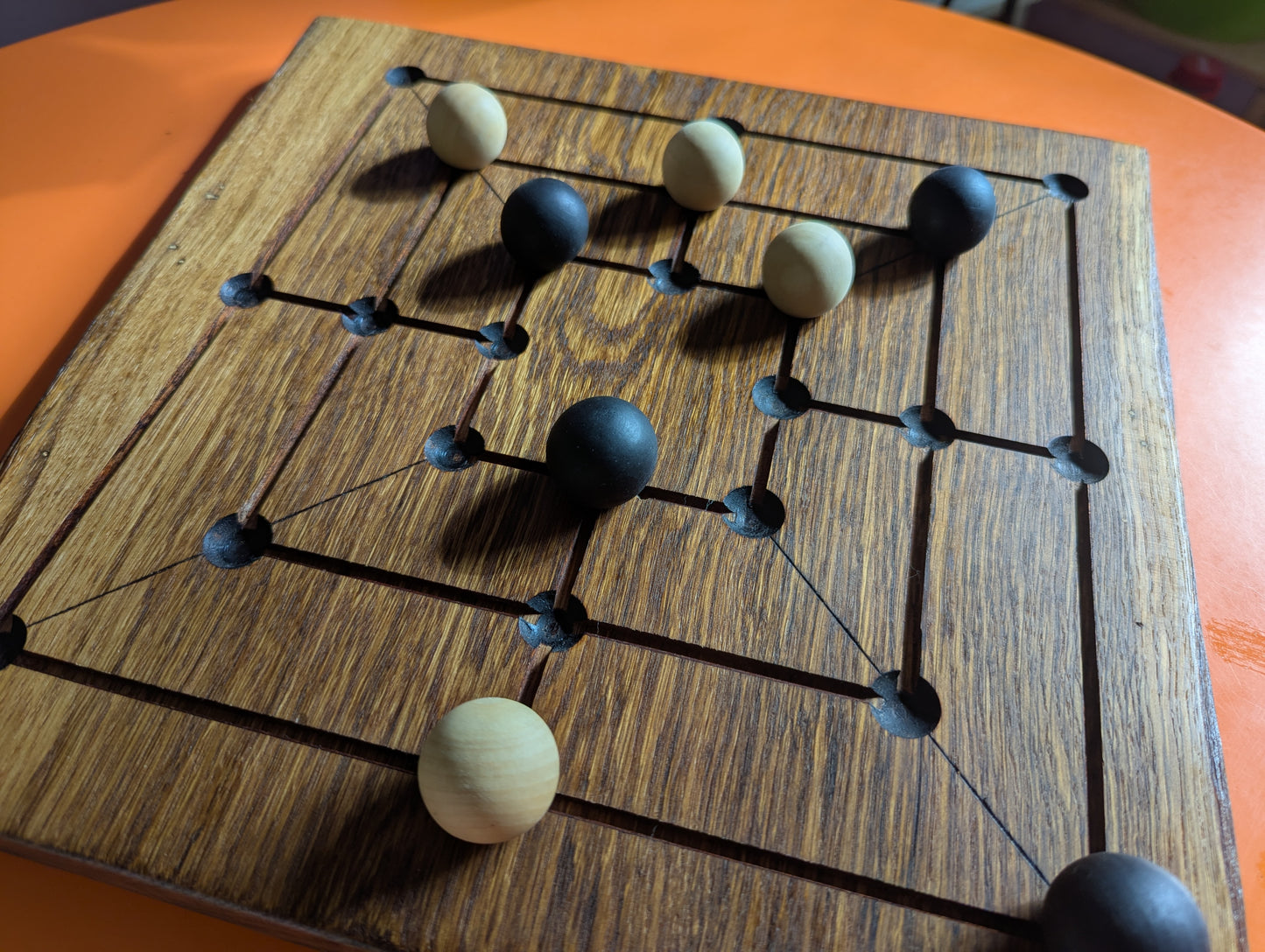 Handmade Twelve/Nine men's Morris game set. Solid oak wood board with live egde.