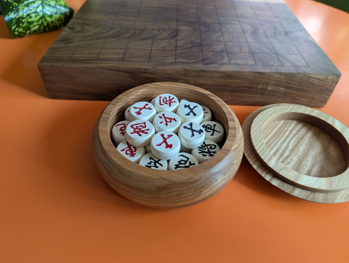 Solid walnut Xiangqi game set. Hand carved lines
