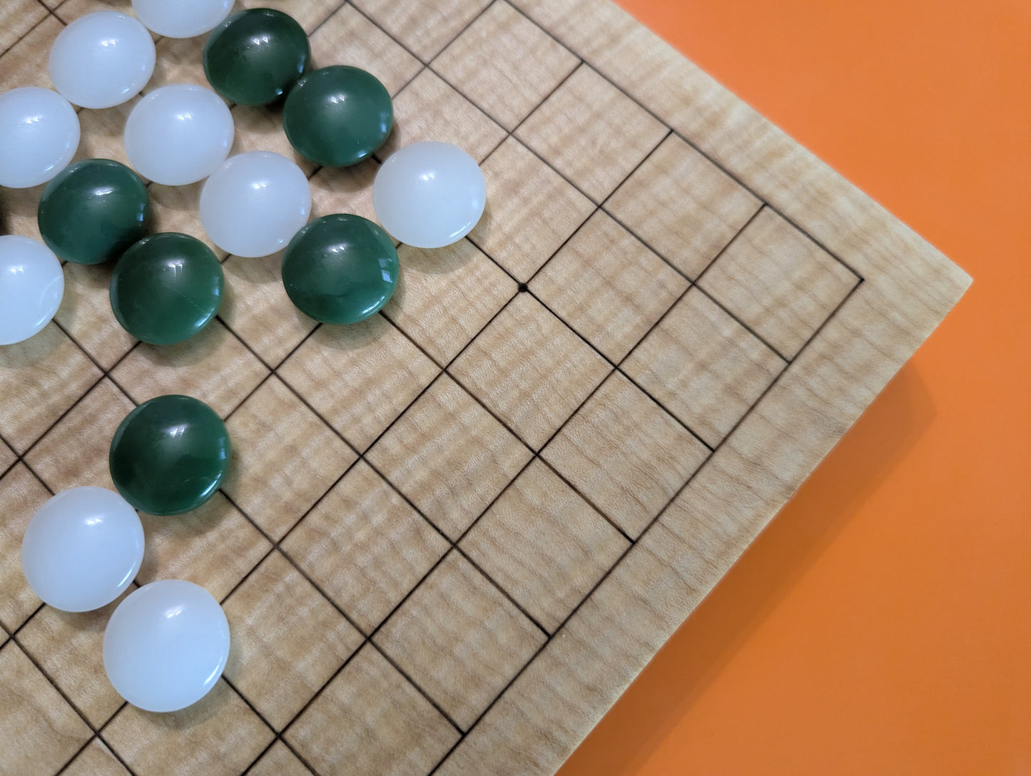 Solid maple 9x9 Goban with wave grain wood. Hand carved game Go board.