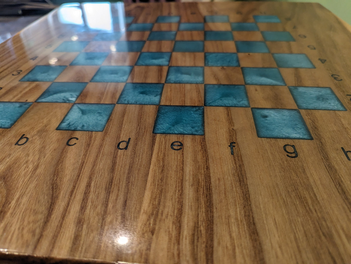 Handmade 23" chess table with notations. Wood and epoxy.