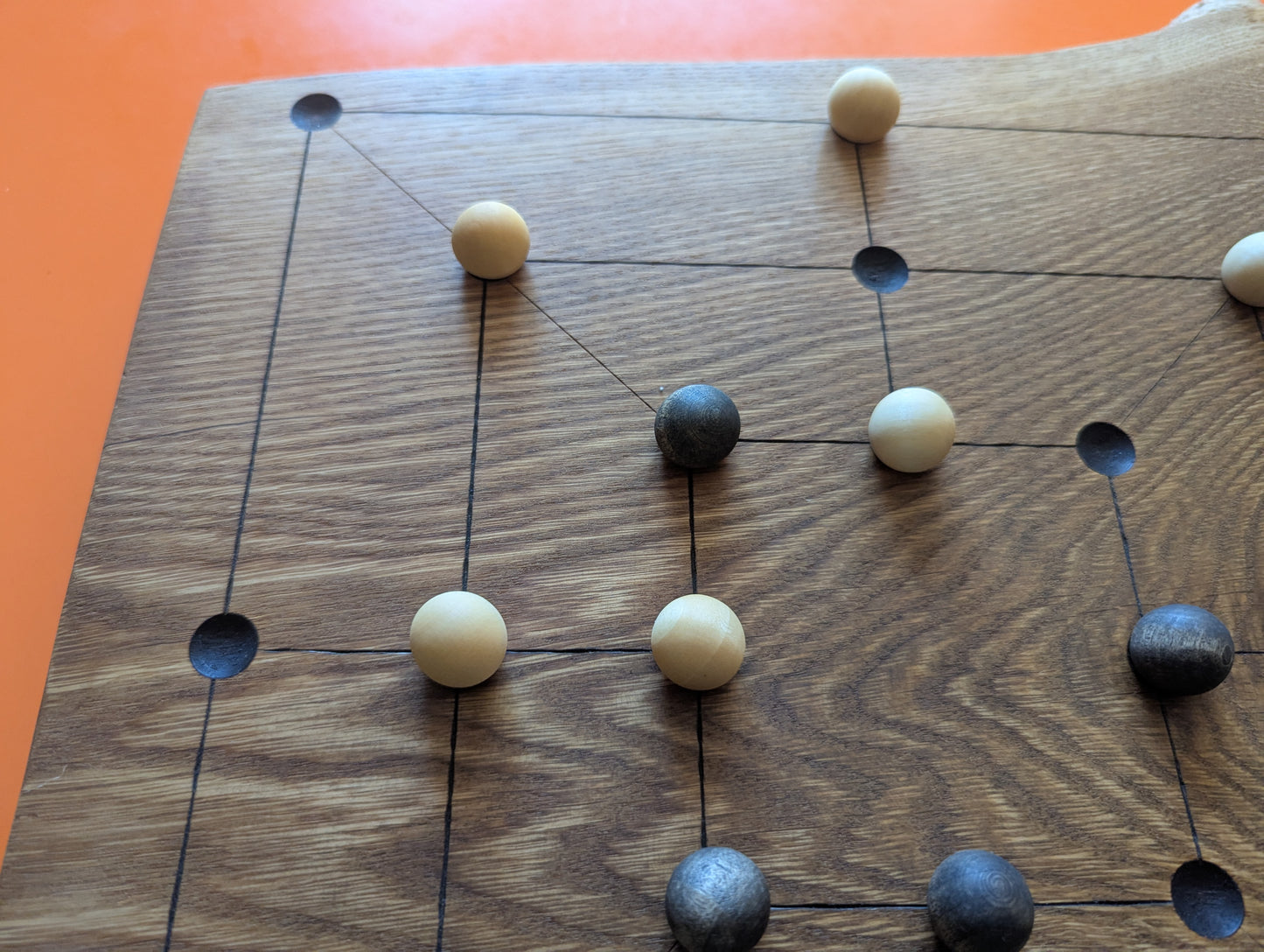 Handmade Twelve/Nine men's Morris game set. Solid elm wood board with live egde.
