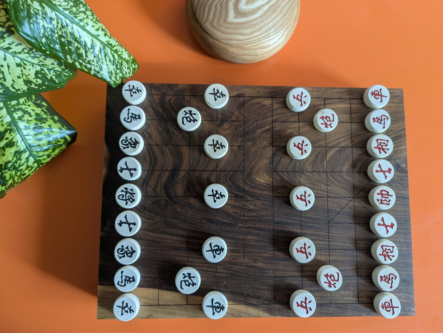 Solid walnut Xiangqi game set. Hand carved lines