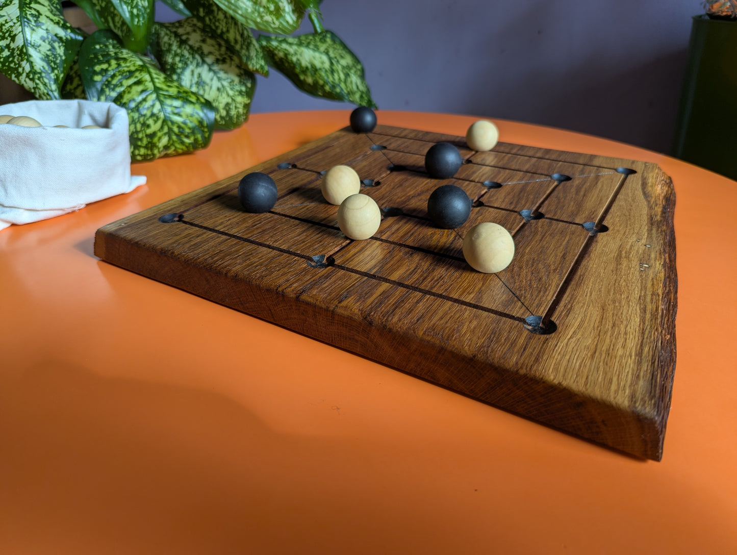 Handmade Twelve/Nine men's Morris game set. Solid oak wood board with live egde.