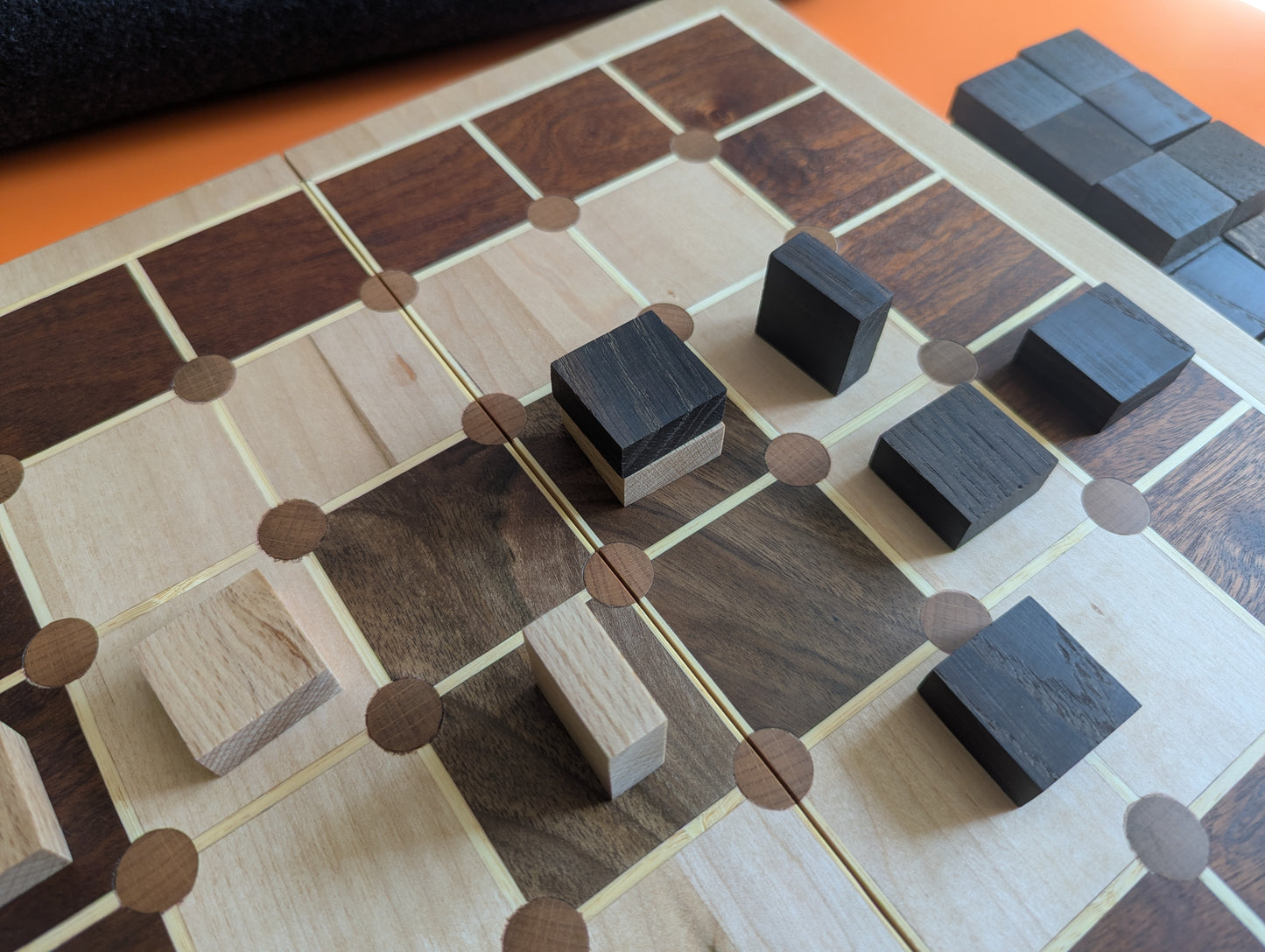 Foldable wooden Tak game set.