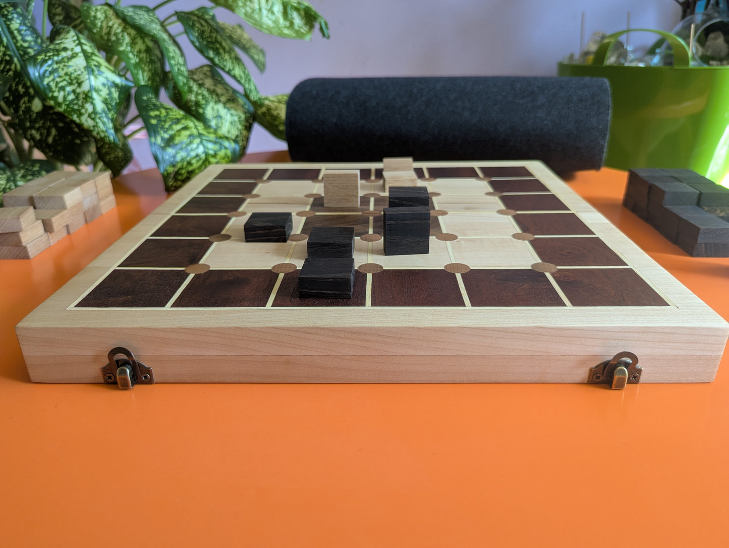Foldable wooden Tak game set.