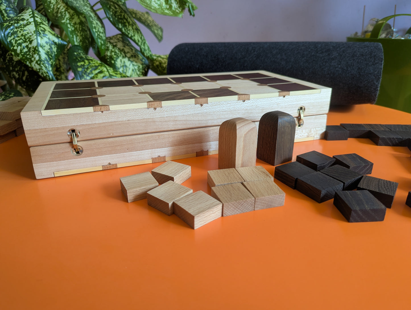 Foldable wooden Tak game set.