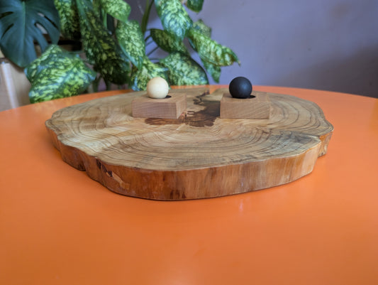 Handmade Volta game set. Circle Juniper board with live edge.
