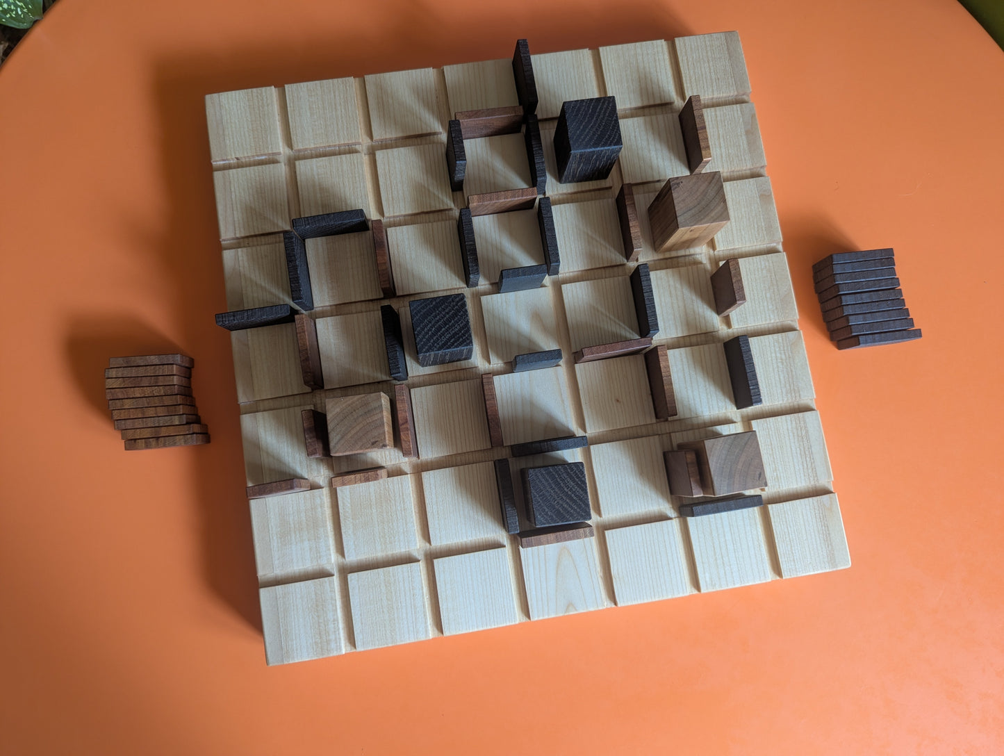 13" wooden Entrapment game set.