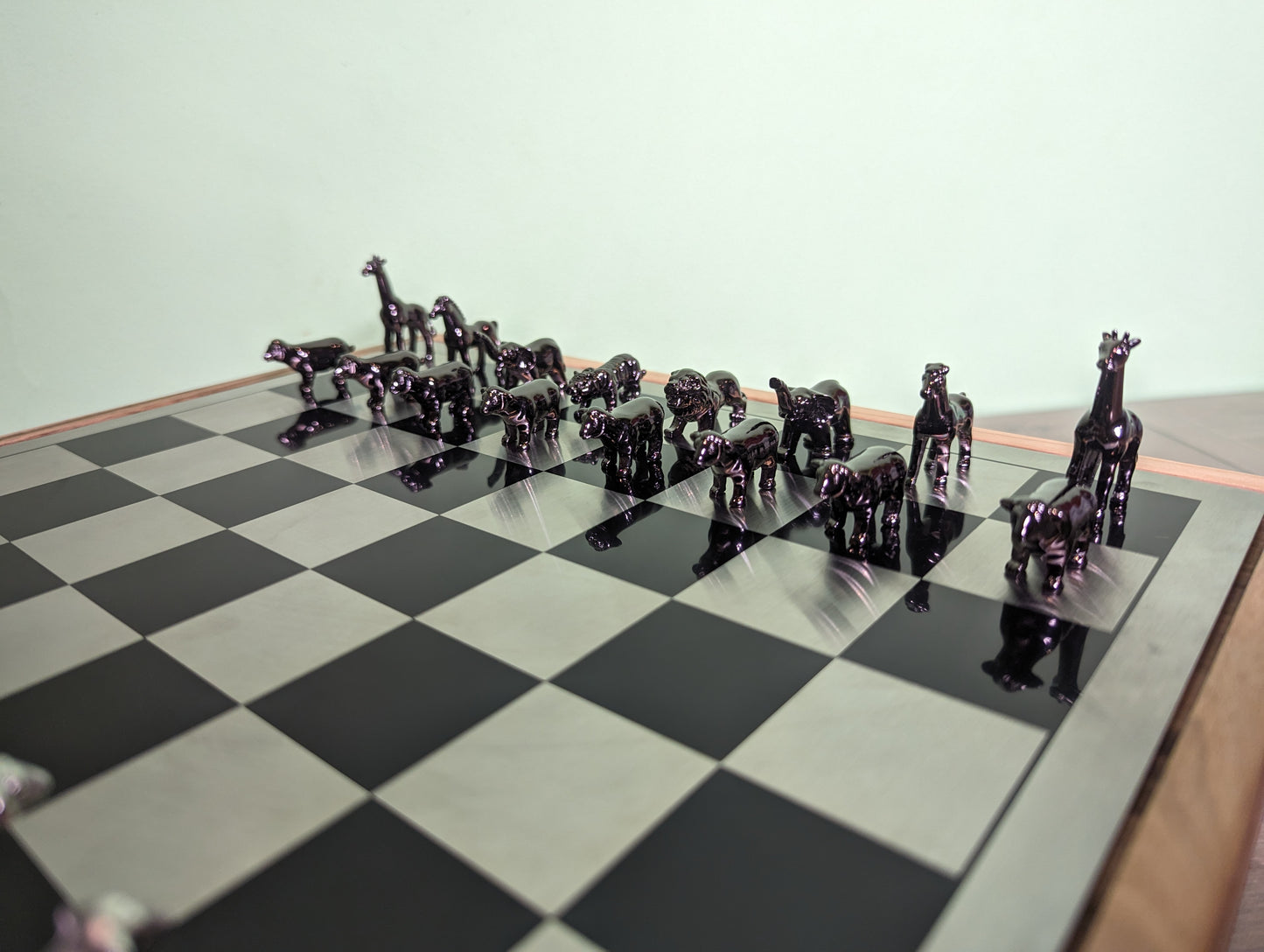 Luxury unusual chess set. Metal animal chess pieces in walnut box