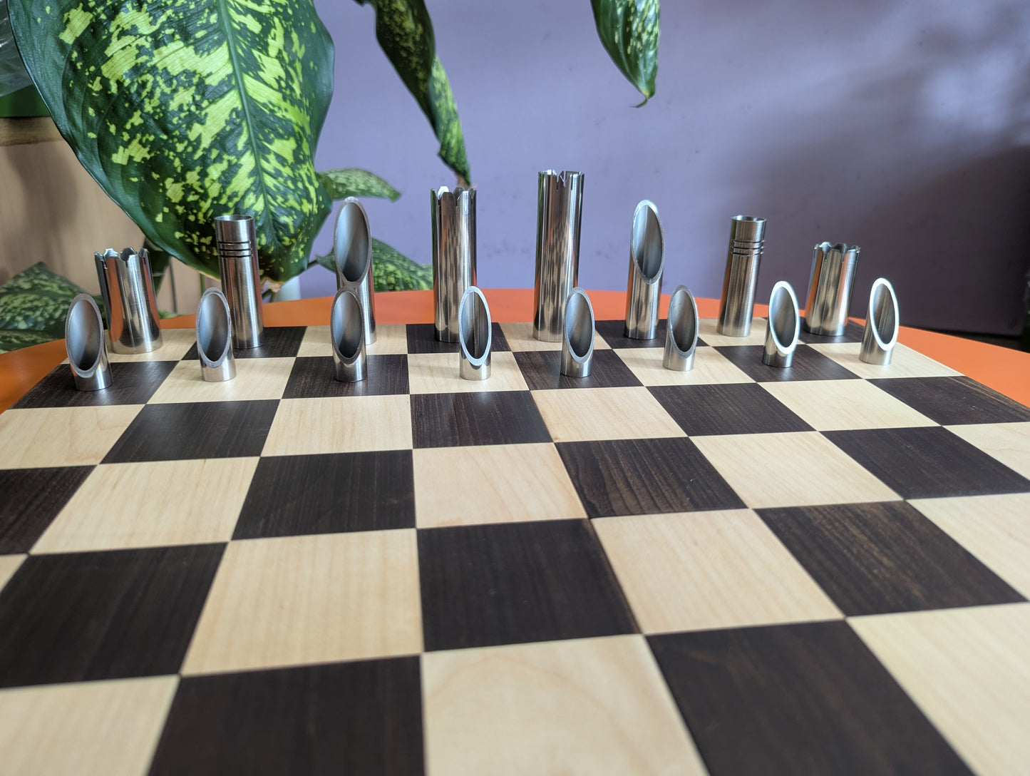 Handmade Stainless Steel Chess Set. Square vs. Round.