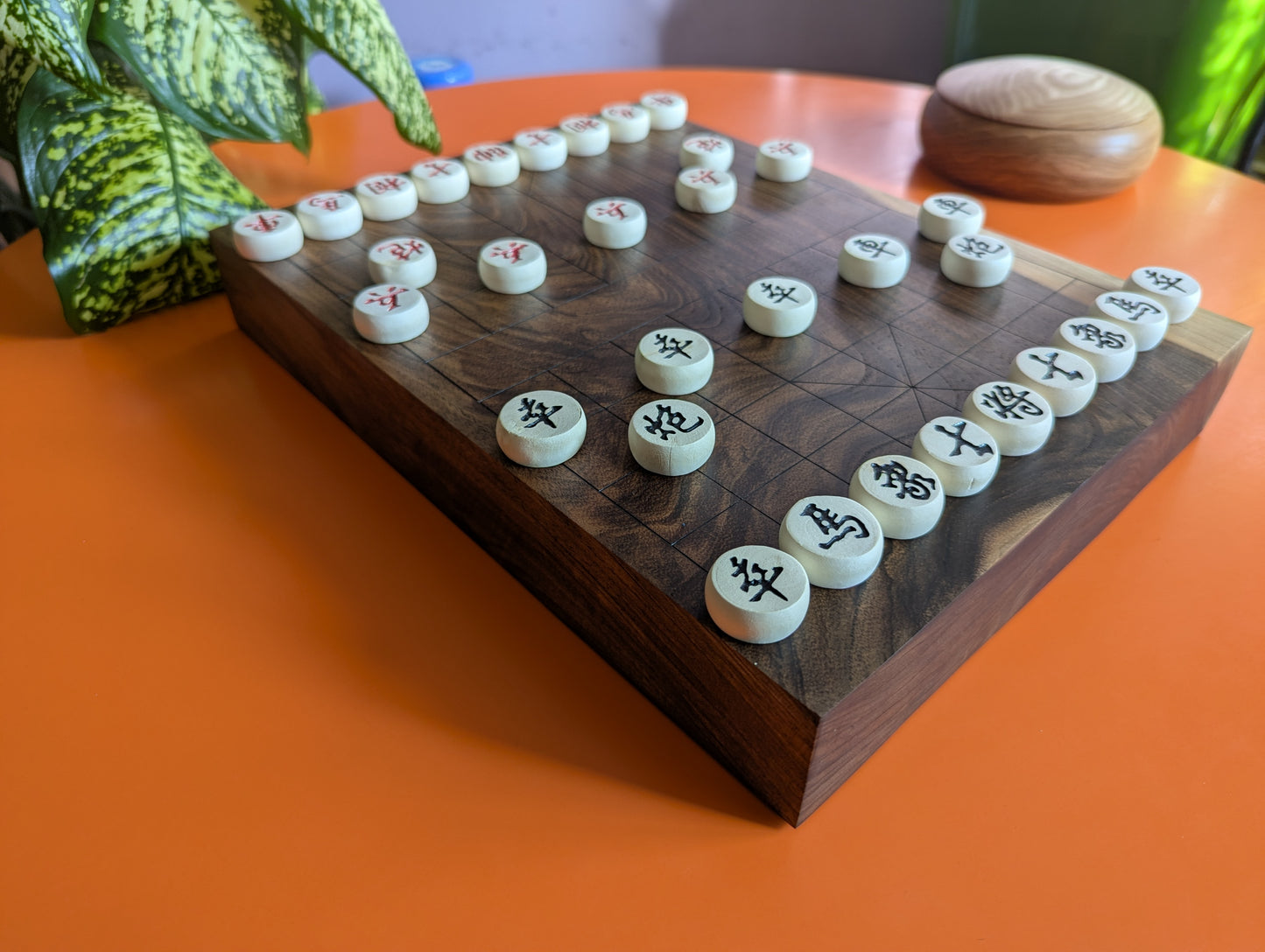 Solid walnut Xiangqi game set. Hand carved lines