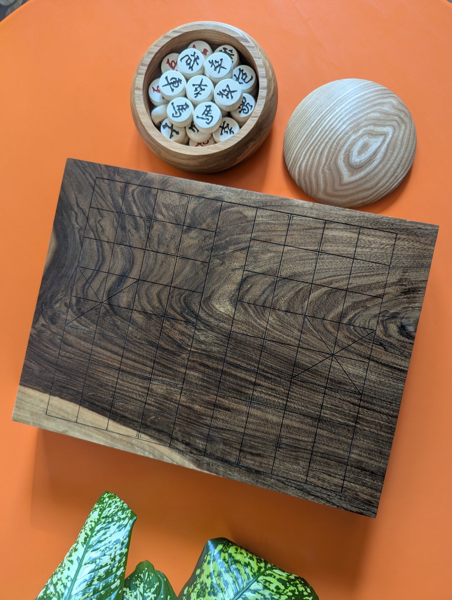 Solid walnut Xiangqi game set. Hand carved lines
